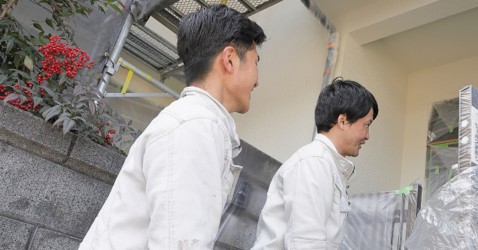 近所のお宅に挨拶している様子