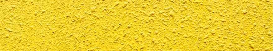 黄色い塗料で塗装した外壁